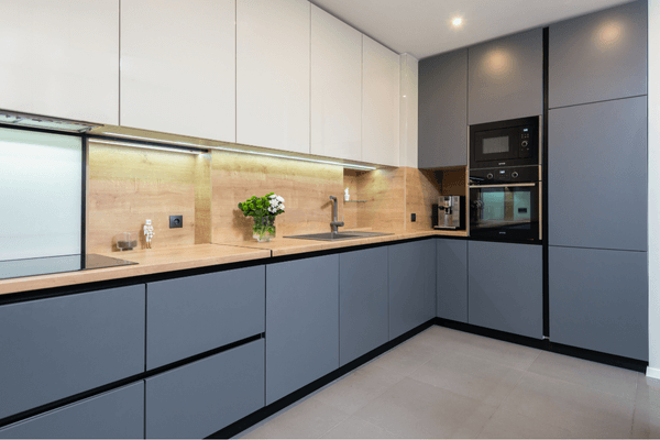 Old, outdated kitchen in Mansarovar before renovation.