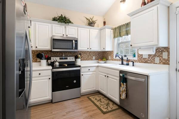 Gorgeous acrylic finish kitchen Mansarovar after complete makeover.